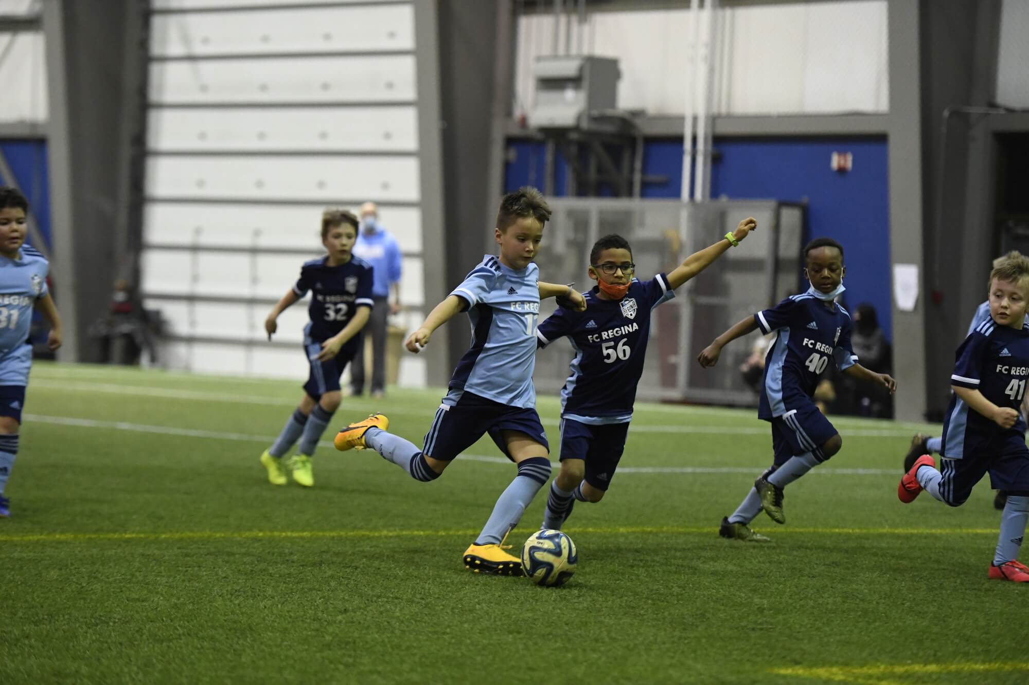 Kid's playing soccer at the Avana Centre at the REAL District in Regina